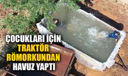 Çocukları için traktörünün römorkunu havuza çevirdi