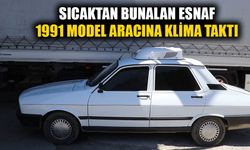 Sıcaktan bunalan esnaf 1991 model aracına klima taktı