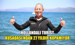 Hollandalı turist yüzmeyi ve dalmayı öğrendiği Kuşadası'ndan 27 yıldır kopamıyor