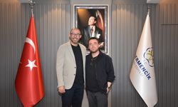 Ünlü şarkıcı Dalkılıç, Başkan Zencirci'yi ziyaret etti