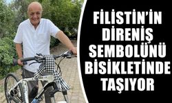 Filistin’in direniş sembolünü bisikletinde taşıyor