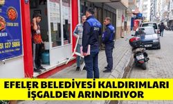 Efeler Belediyesi kaldırımları işgalden arındırıyor