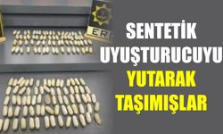Midelerinde uyuşturucu taşıyan 2 kişi tutuklandı