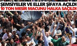 Şemsiyeler ve eller şifaya açıldı, 10 ton mesir macunu halka saçıldı