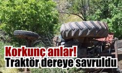 Devrilen traktörün altında kaldı!
